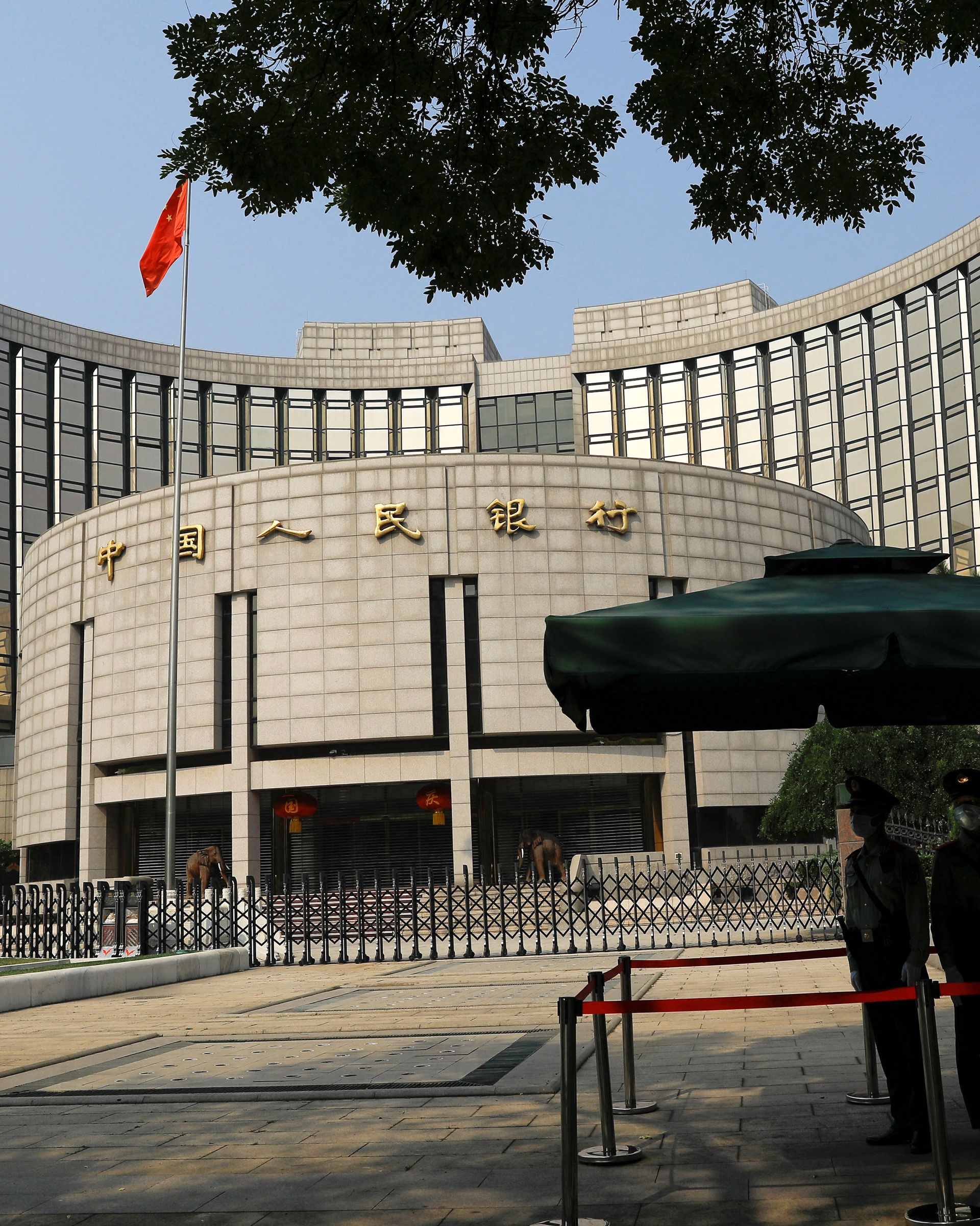 China central bank unexpectedly cuts rates to support economy